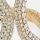 Nubifero, nickel-gold, swatch