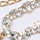 Docenza, nickel-gold, swatch