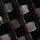 Insidia, black-gold, swatch